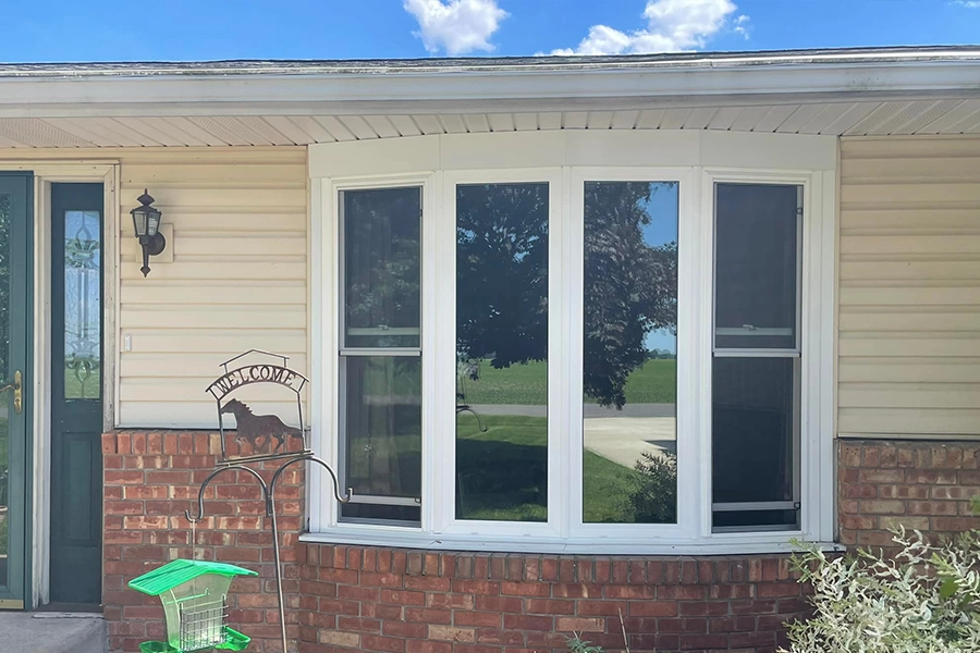 A new bay window with white exterior trim that was replaced by Energy Efficient Replacements in Goshen, IN.
