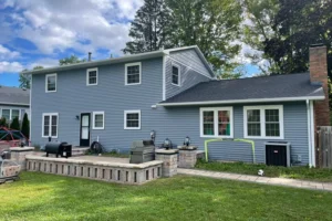 Blue siding on the back of a house in Granger, IN, showcasing a unique siding color.